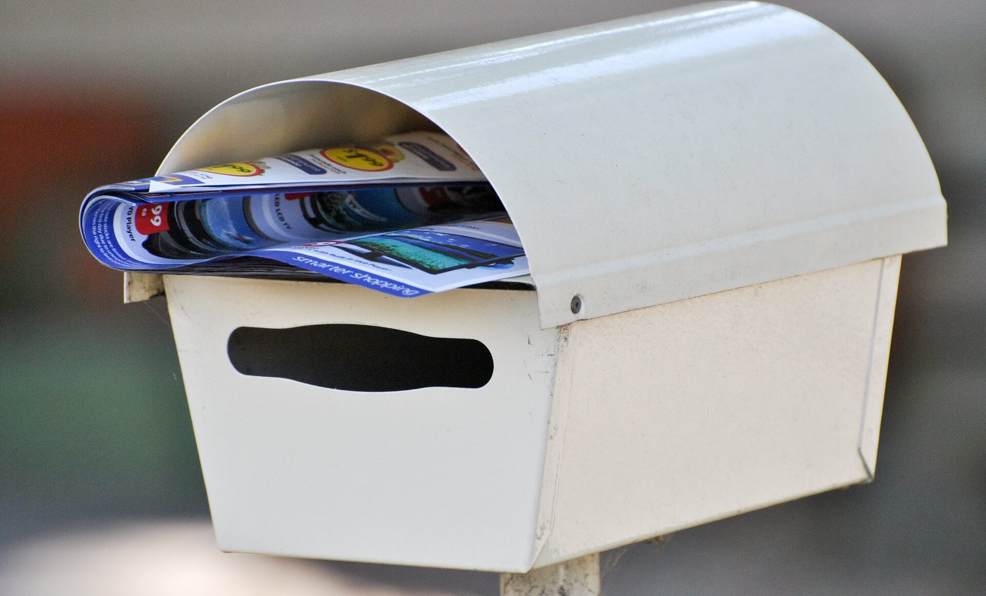 mail box with flyers