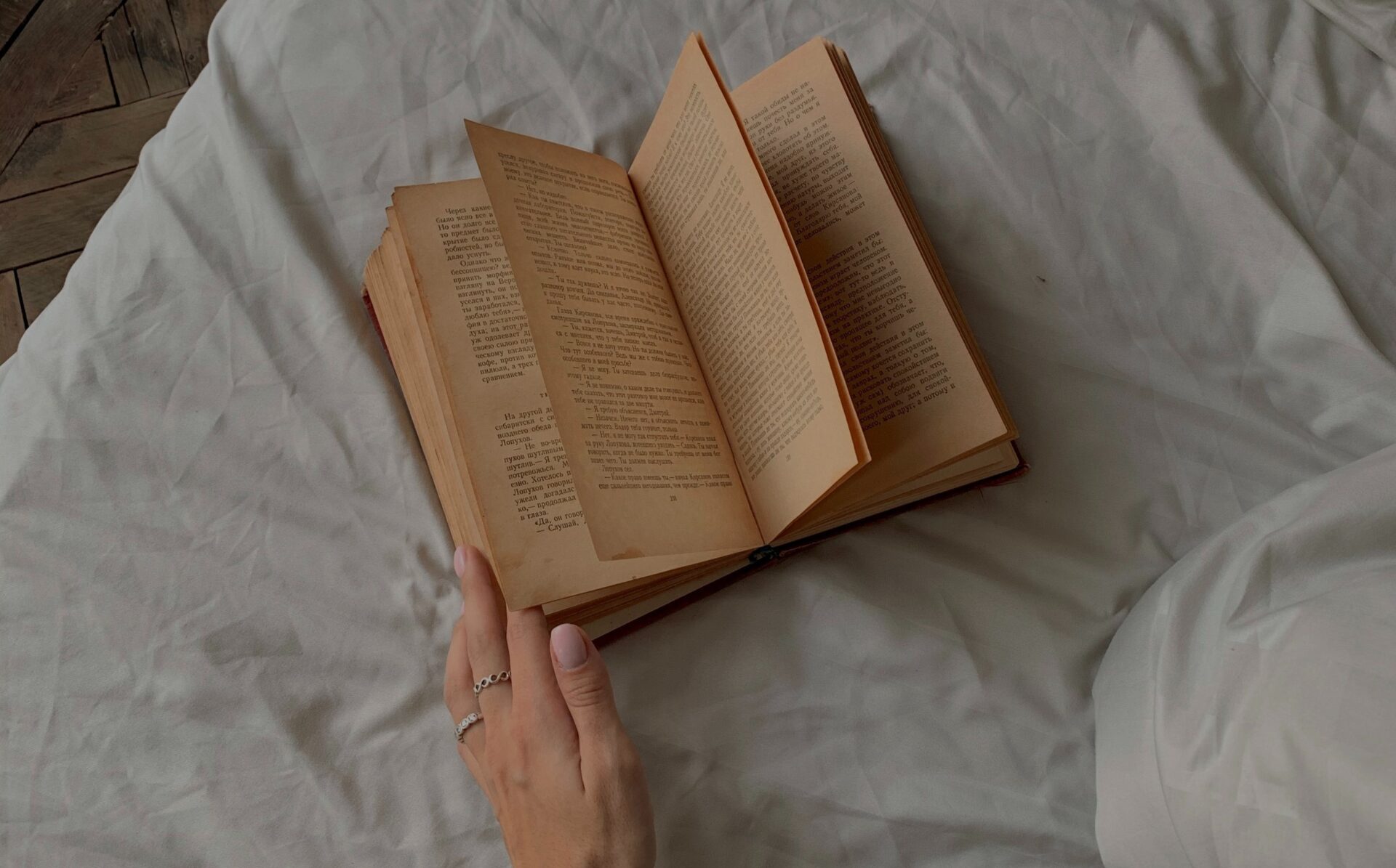 Hand holding book