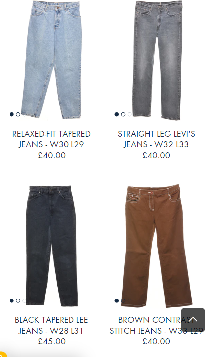 A selection of different types of jeans for sale.