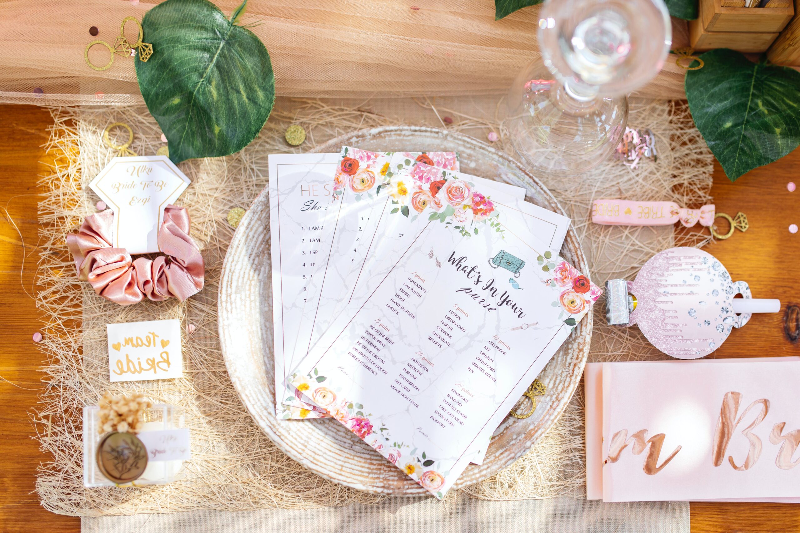 A table with a tablecloth and a bottle of wine, perfect for hen party activities.