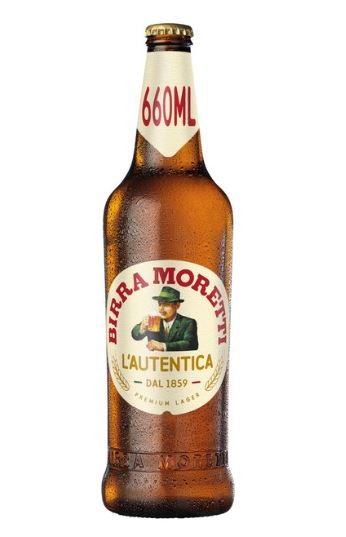 A 660ml bottle of birra moretti beer with condensation.