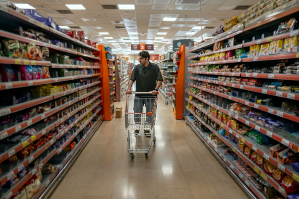 Person shopping in Sainsburys Person shopping in Sainsburys