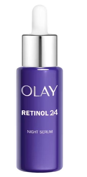 A purple bottle of Olay Retinol 24 Night Serum with a silver cap and white dropper.