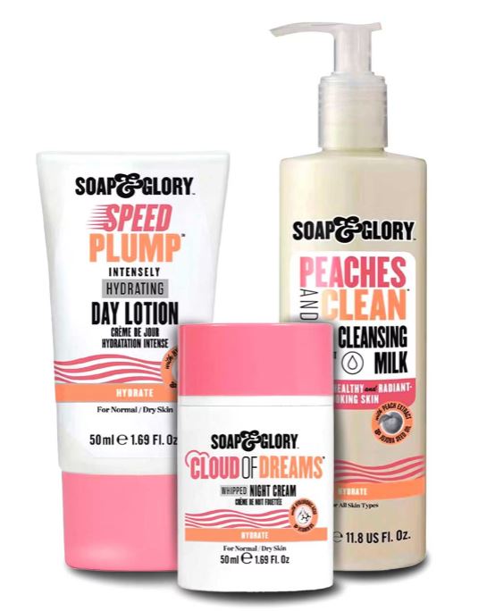 Three Soap & Glory skincare products: Speed Plump Day Lotion, Peaches and Clean Cleansing Milk, and Cloud of Dreams Night Cream, arranged side by side.