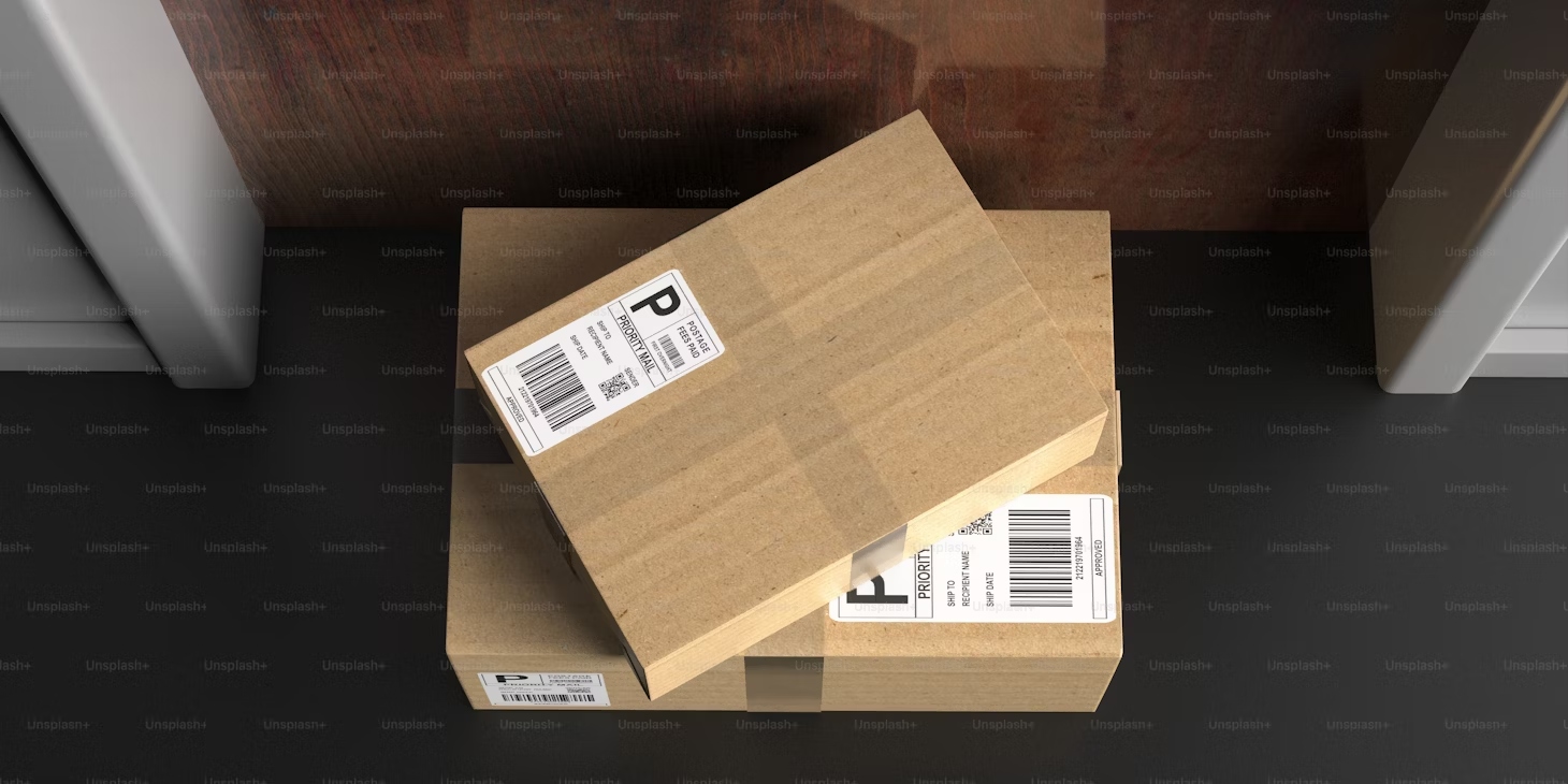 An image showing two Amazon Prime Day deliveries sitting outside somebody's door in cardboard packates