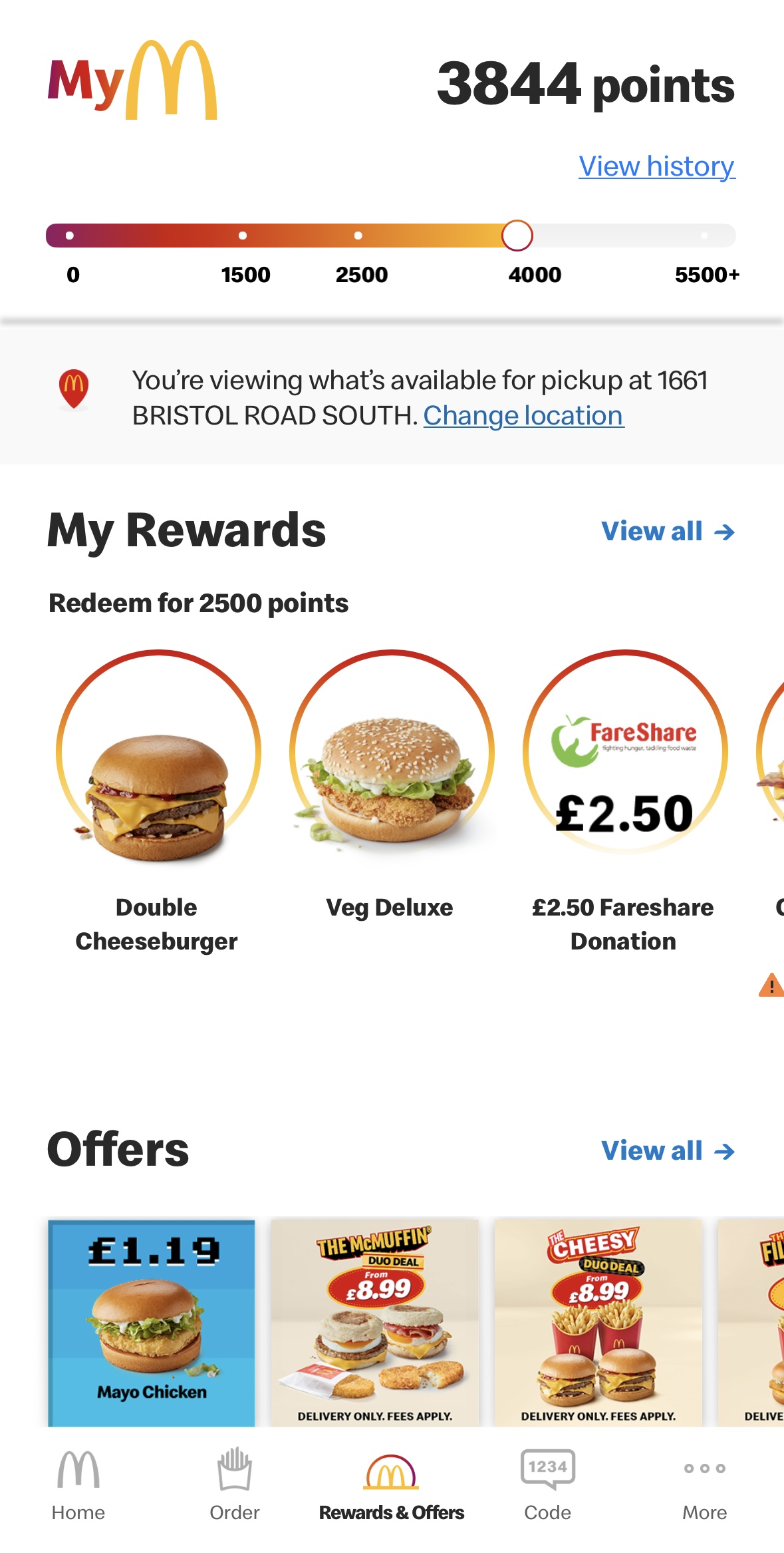 Screenshot of McDonald's app showing 3844 points, available McDonald's rewards to redeem like Double Cheeseburger and Veg Deluxe, a £2.50 FareShare donation option, and current McDonald's offers.