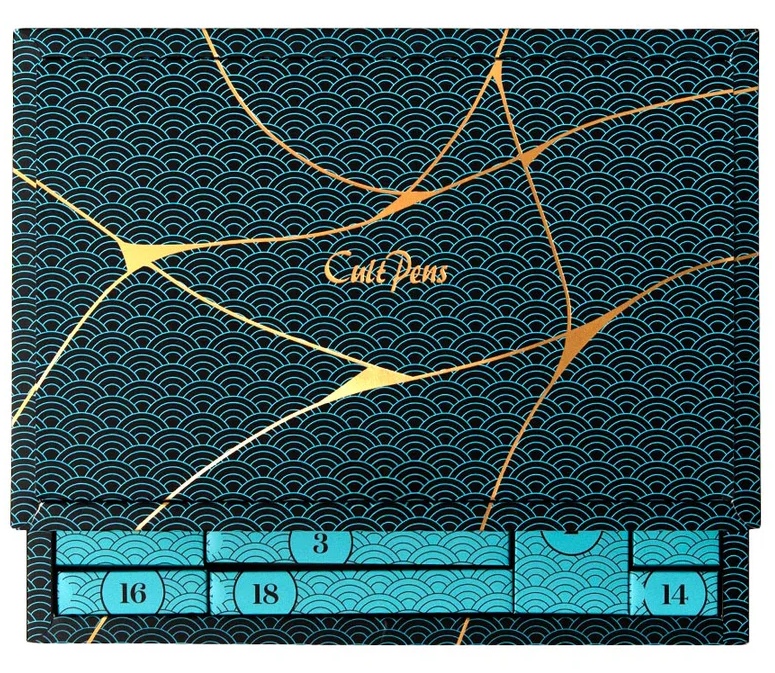 Cult Pens advent calendar 2025 A half-opened Cult Pens stationery advent calendar for 2025, revealing a few doors