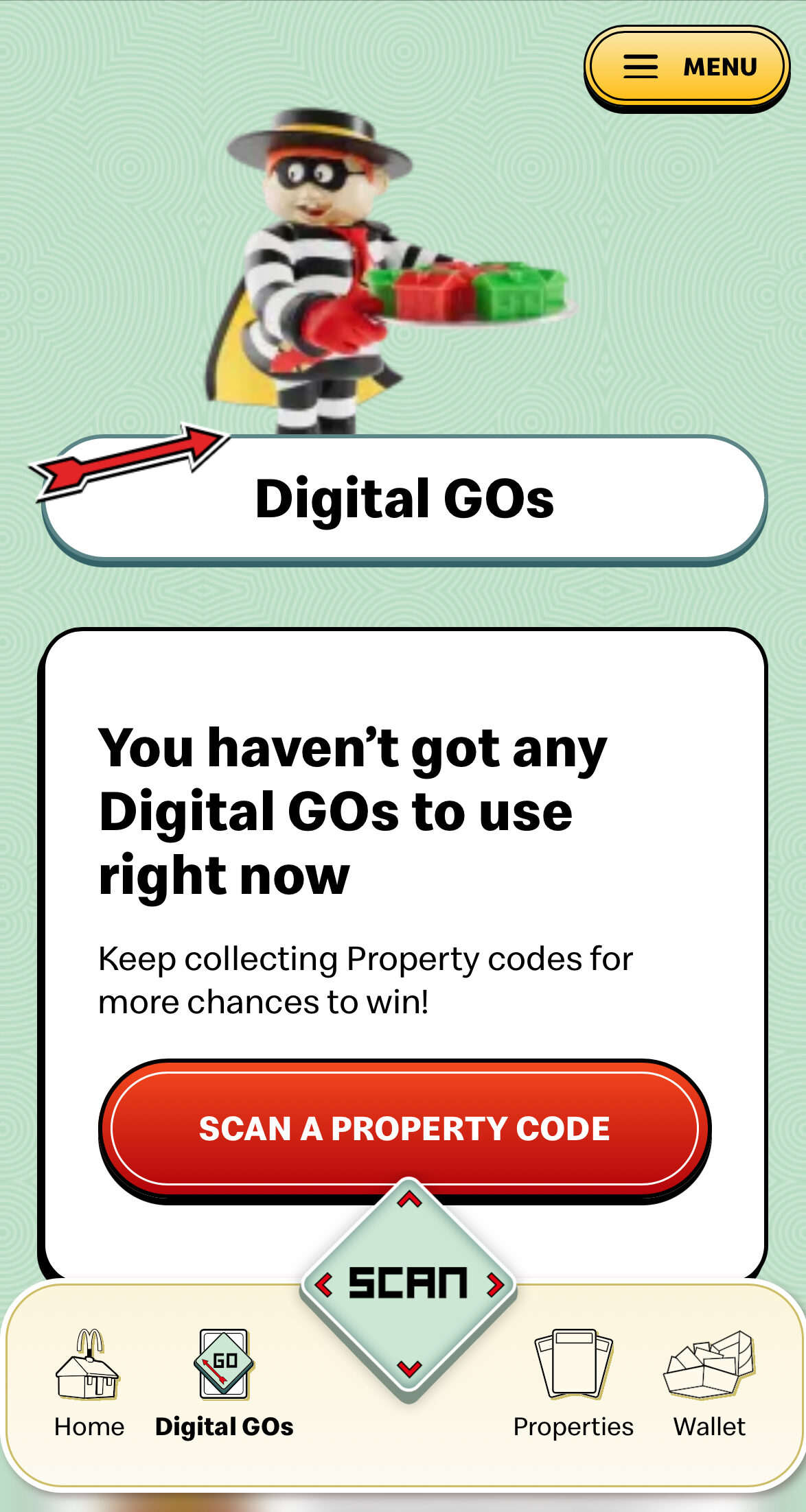 Screenshot of a McDonald's app page showing a LEGO character, "Digital GOs" heading, and a message stating no Digital GOs are available. A red button prompts to scan a property code.