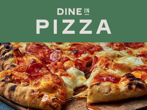 M&S pizza meal deal An image of a pizza being torn apart for the M&S pizza dine in deal