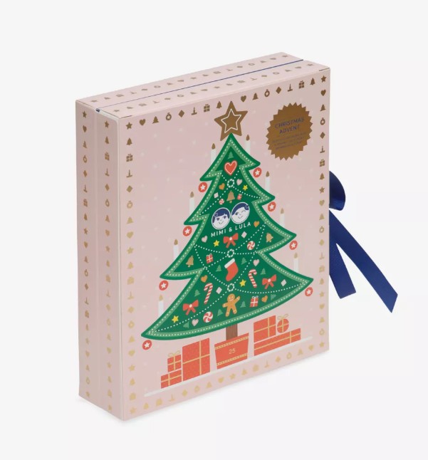 Mimi & Lula Advent Calendar 2025 A rectangular box with a decorated Christmas tree, gifts, and gold accents on the front; a blue ribbon is tied on the right side.