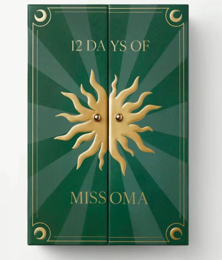 Missoma Gold Advent Calendar 2025 A green box with gold sun design and text reading "12 Days of Missoma" on the front.