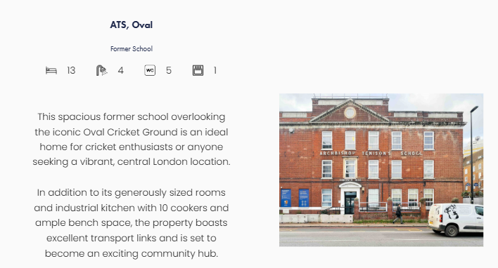 Red-brick former school building with arched windows and 