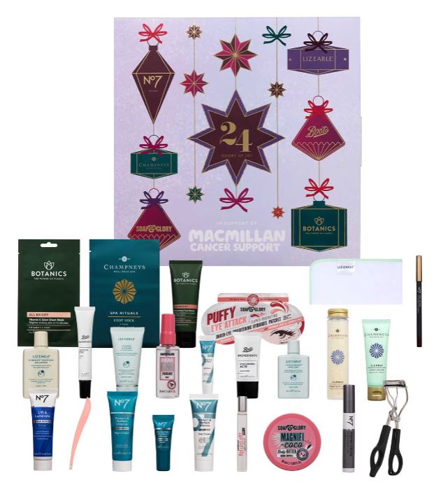 A collection of beauty and skincare products arranged below a Macmillan Cancer Support advent calendar box displaying the number 24.