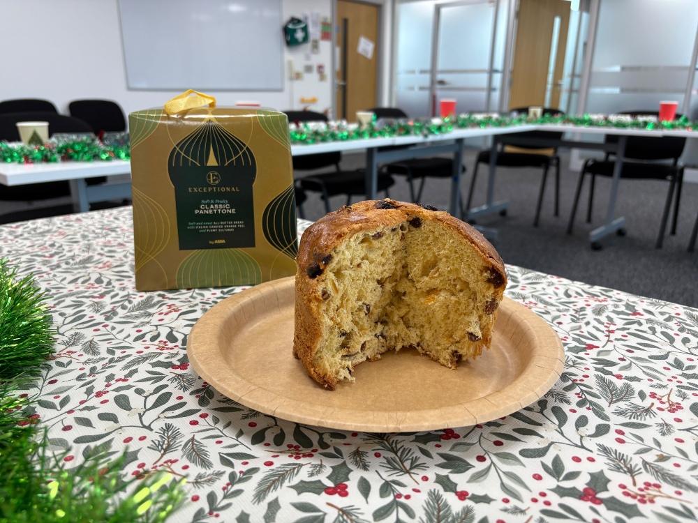 An image showing a sliced Asda panettone shot through with fruit