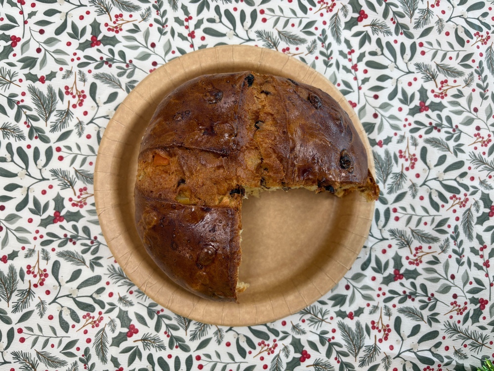 A top-down image showing a sliced Morrisons panettone