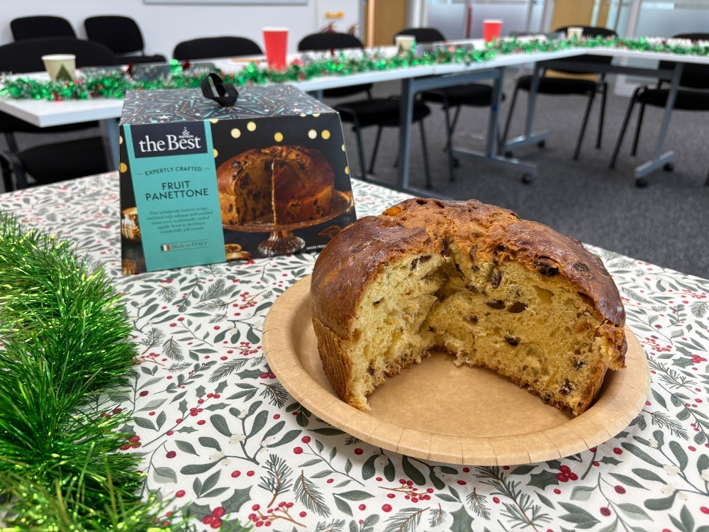 An image showing a supermarket Morrisons panettone in front of its box