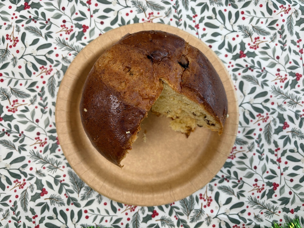 A top-down image of a deflating Tesco panettone after slicing