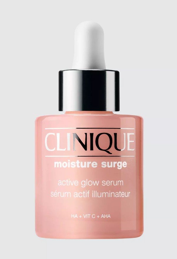 Clinique Moisture Surge Active Glow Serum A bottle of Clinique Moisture Surge Active Glow Serum with a dropper cap, featuring white text and a pink-tinted liquid inside.