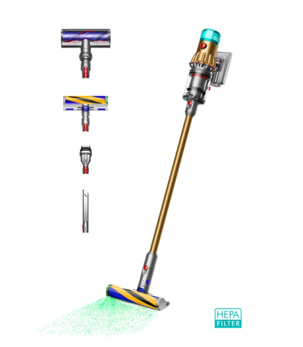 Dyson V12 Detect Slim Absolute vacuum blue Cordless stick vacuum cleaner with multiple interchangeable attachments and a HEPA filter badge, shown emitting green particles from the main floor head.