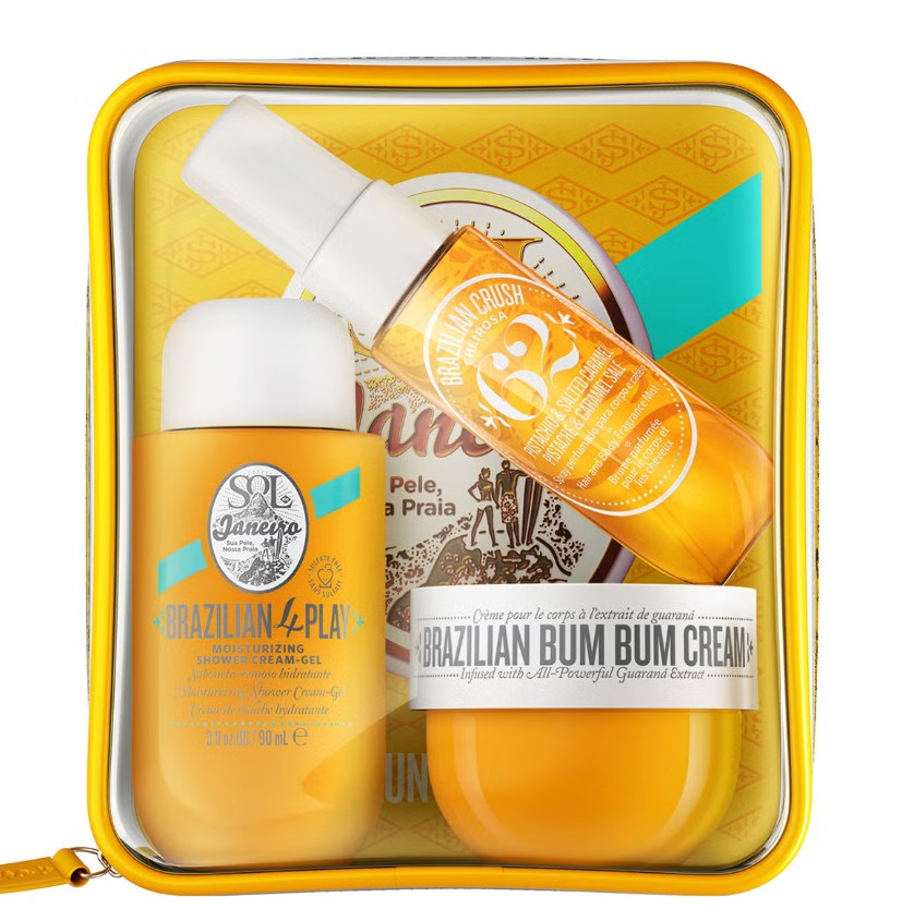 Sol de Janeiro Bum Bum Jet Set Yellow zippered pouch containing Sol de Janeiro Brazilian 4 Play Shower Cream-Gel, Brazilian Crush Body Fragrance Mist, and Brazilian Bum Bum Cream.