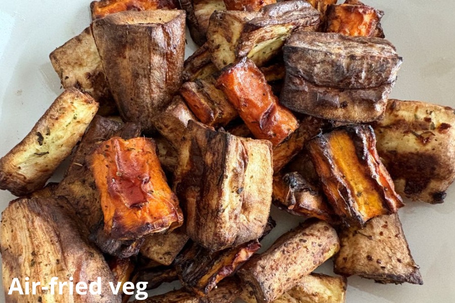 Chunks of air fryer vegetables cooked and glazed.