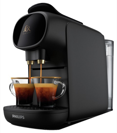Black Philips L'OR coffee machine brewing two cups of espresso, with glass cups positioned under the dual spouts.