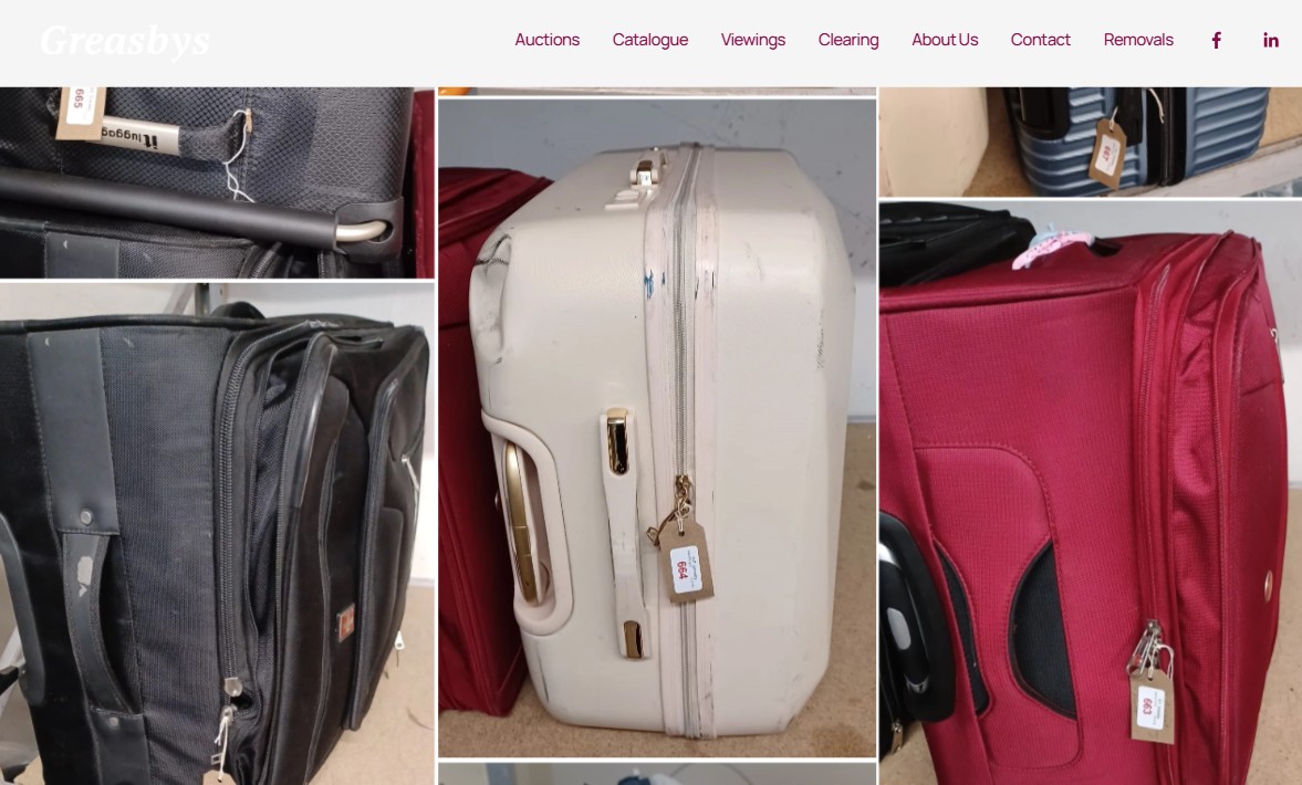 Collage of various suitcases in black, white, and red, each with a numbered tag attached, displayed on the Greasbys auction website.