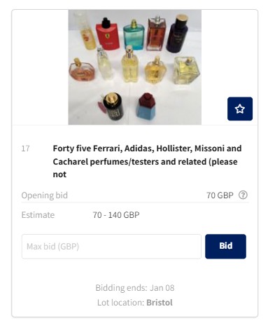 A selection of assorted perfume and tester bottles from brands like Ferrari, Adidas, Hollister, Missoni, and Cacharel arranged on a white surface.