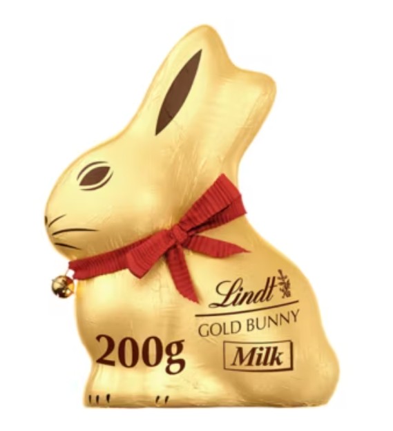 A gold-foil-wrapped Lindt chocolate bunny with a red ribbon and bell, labeled “200g GOLD BUNNY Milk.”.