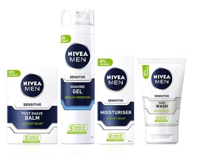 nivea men Four Nivea Men Sensitive skincare products: post shave balm, shaving gel, moisturizer, and face wash, each labeled with "0% alcohol" and "5 signs of skin irritation" relief.