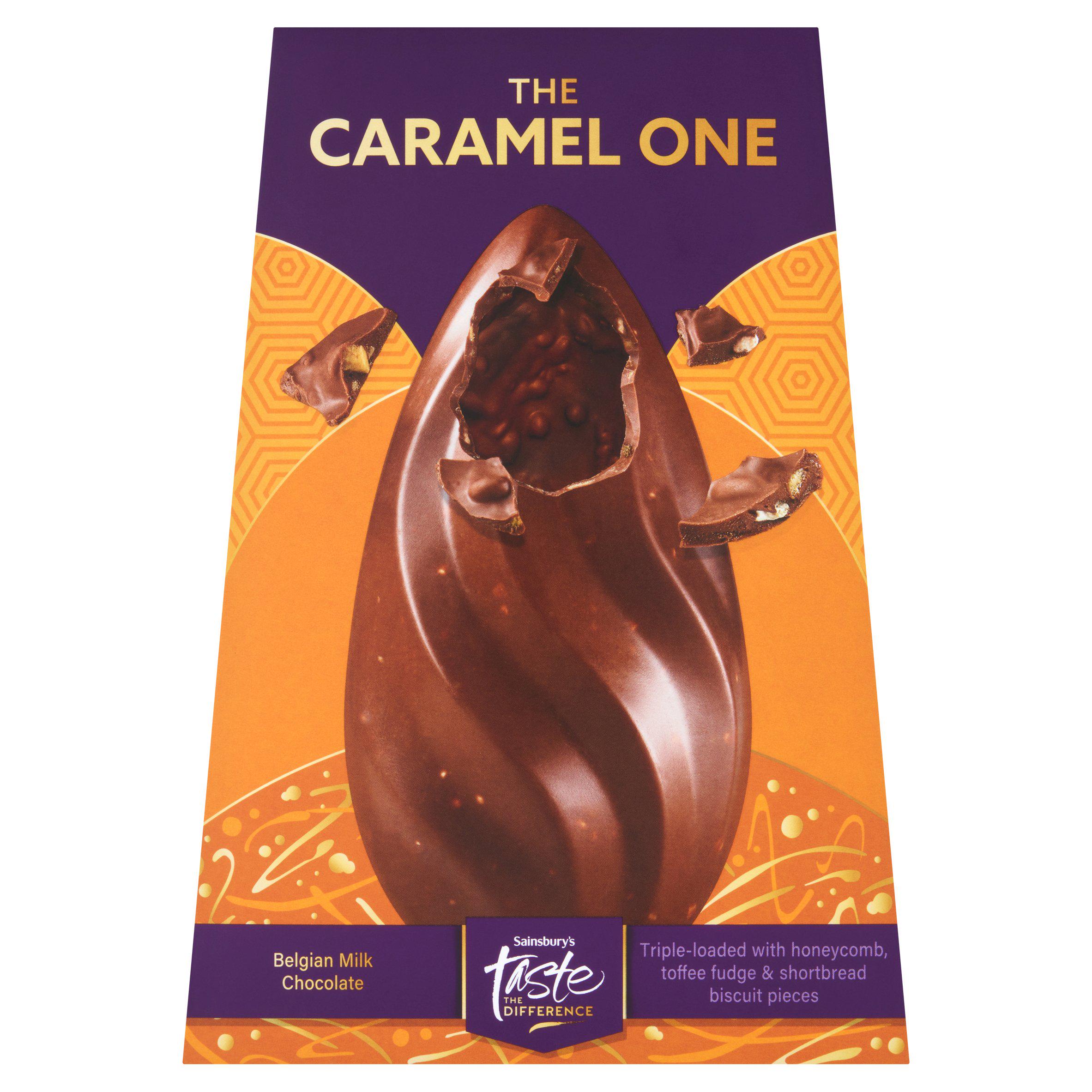 A Sainsbury's Taste the Difference "The Caramel One" Belgian milk chocolate egg with honeycomb, toffee fudge, and shortbread biscuit pieces on an orange and purple box.