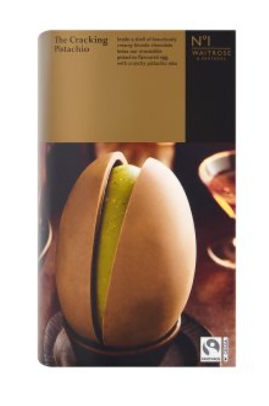 Box of "The Cracking Pistachio" chocolate egg from Waitrose, featuring an egg-shaped chocolate shell with a green pistachio filling inside.