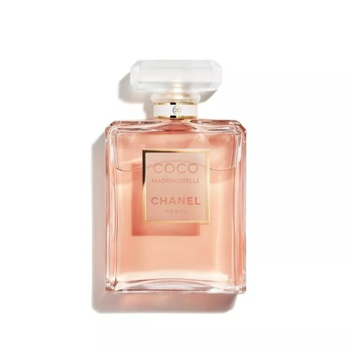 A clear glass bottle of Chanel Coco Mademoiselle perfume with a light pink liquid and a rectangular label, photographed on a white background.