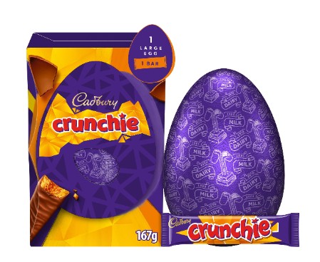 Cadbury Crunchie Easter egg set with a large purple foil-wrapped chocolate egg, Crunchie branding, and a Crunchie chocolate bar, shown in front of its packaging.