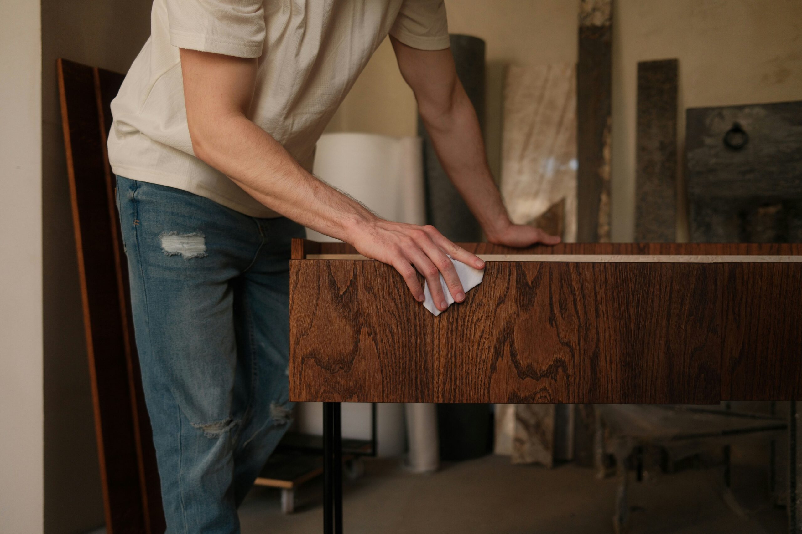 furniture cleaning storage auctions A person cleaning and fixing up furniture bought in a storage locker auction