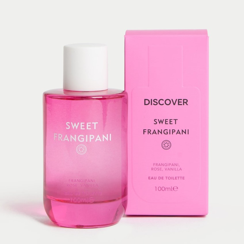 A pink perfume bottle labeled "Sweet Frangipani" is placed next to its matching pink box labeled "Discover Sweet Frangipani, Eau de Toilette, 100ml.