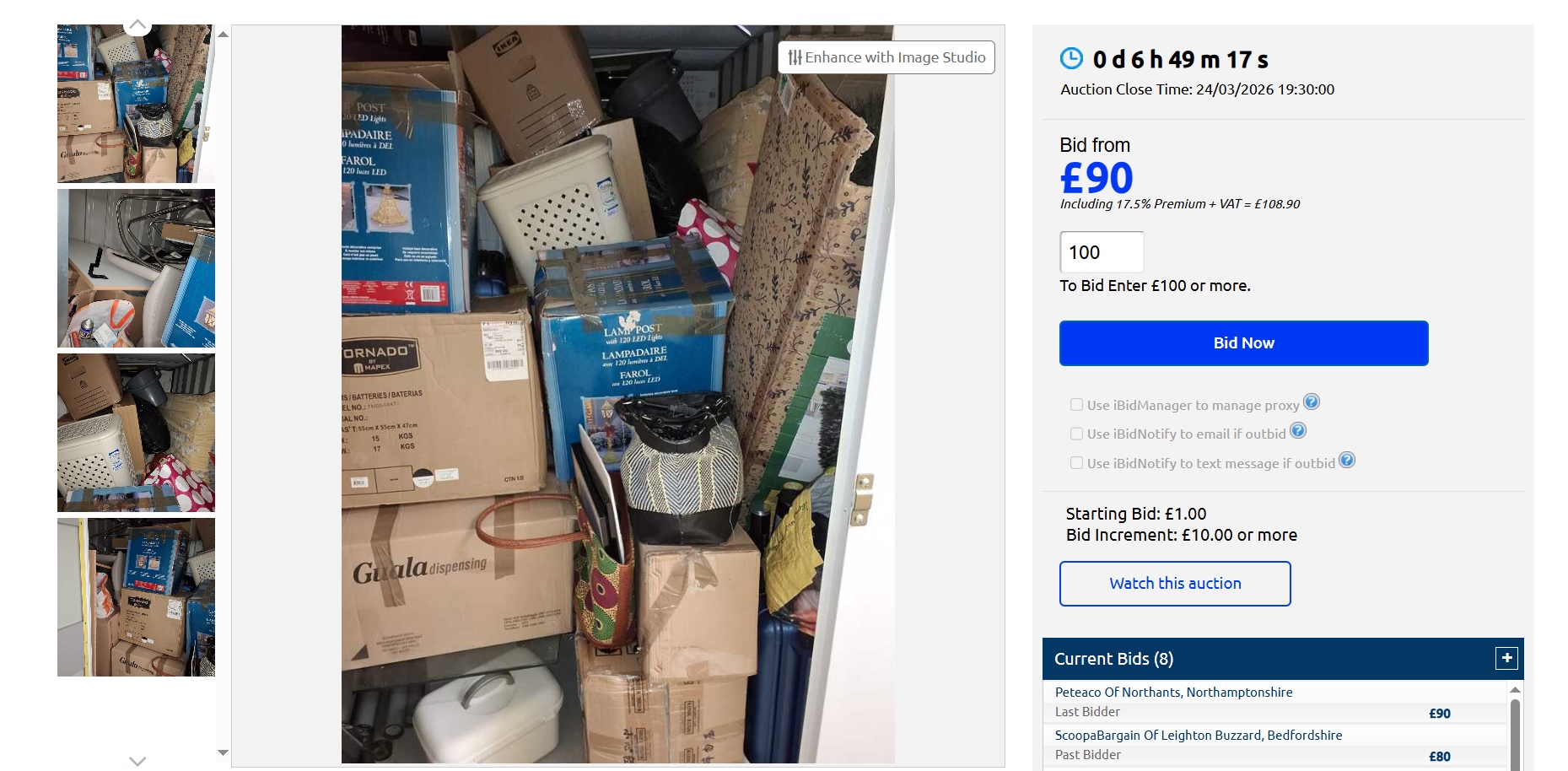 packed storage locker auction A packed locker full of boxes that need to be sorted through after a storage auction