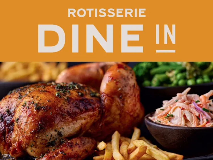 An image showing a cooked rotisserie chicken with fries and coleslaw in an M&S Dine In for 2 meal