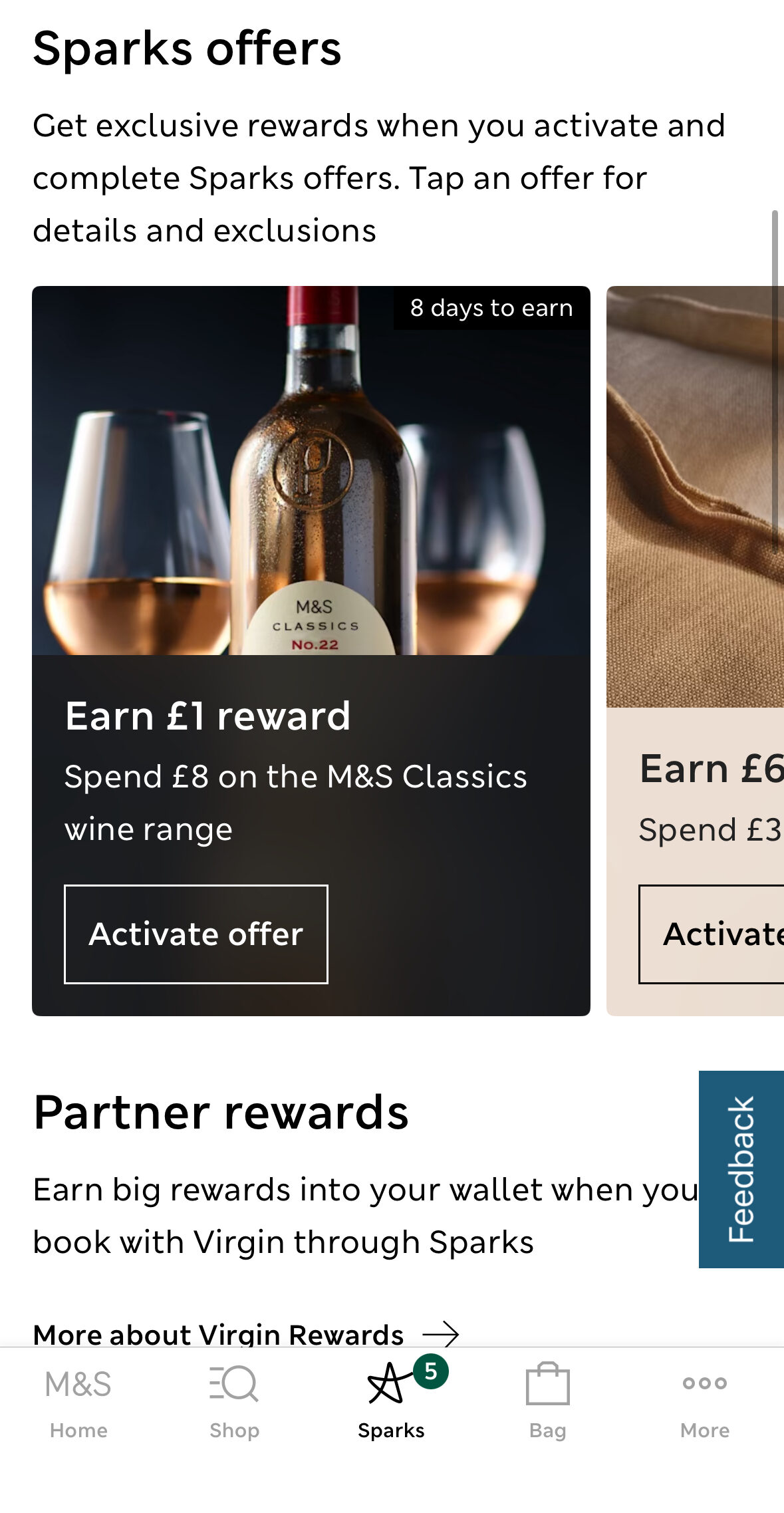 IMG_5821 A phone screen displays an M&S Sparks offer to earn £1 reward when spending £8 on M&S Classics wine, with an "Activate offer" button below a photo of a wine bottle and two glasses.