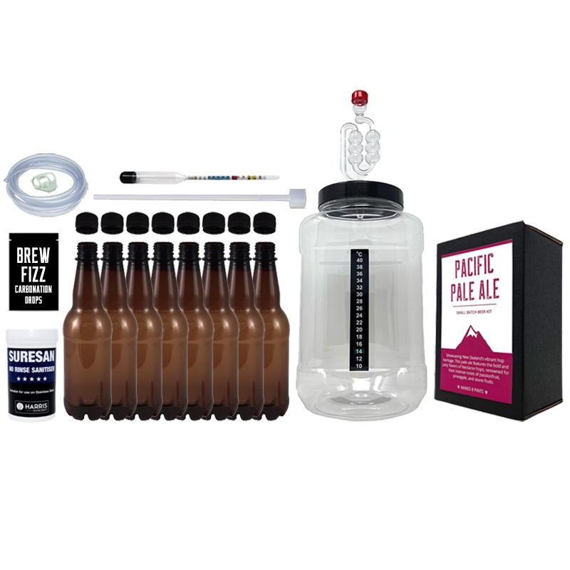 An image showing the beer making equipment in the Dark Rock brewing starter set, including a gallon jug, malt and yeast, bottles, and more
