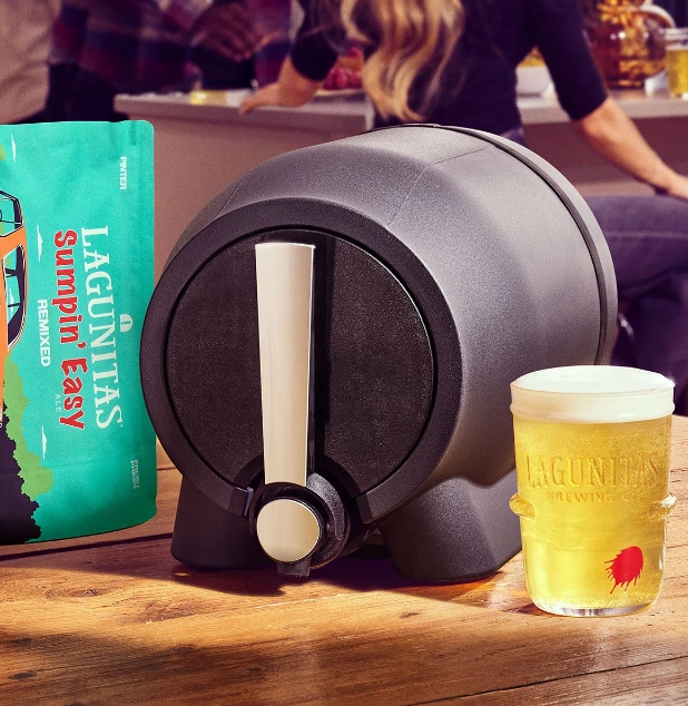 An image showing a Pinter beer tap next to a pint of homebrew beer it's poured