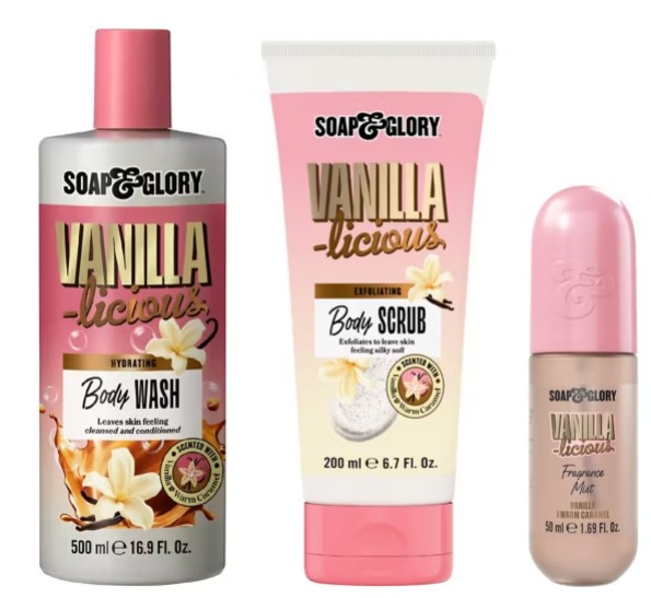 soap and glory Three Soap & Glory Vanilla-licious products: a hydrating body wash, exfoliating body scrub, and fragrance mist, displayed upright with vanilla flower graphics on the packaging.
