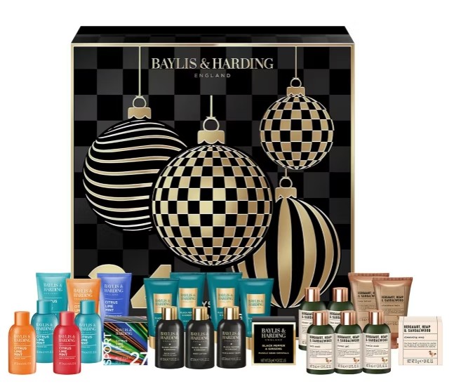 baylis and harding 2026 Baylis & Harding gift set with various bath and body products displayed in front of a black and gold chequered box with large bauble designs.