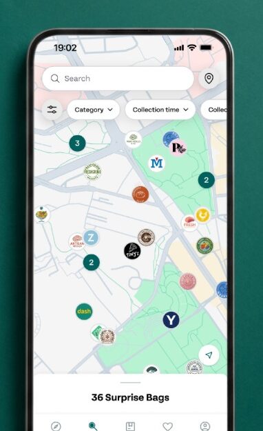 too good to go map sep26# Smartphone screen shows a map with bakery and restaurant icons, collection points, and a list of 36 surprise bags available for collection. Text above reads, “Go where the good stuff is.”.